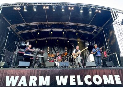 Slinky Machine on stage at the Sidmouth International Jazz and Blues Festival - May2023 (Stage Hire by Slick Staging)