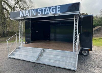 Multi-purpose mobile trailer stage from Slick Staging. Quick set up and we deliver the stage to your venue.